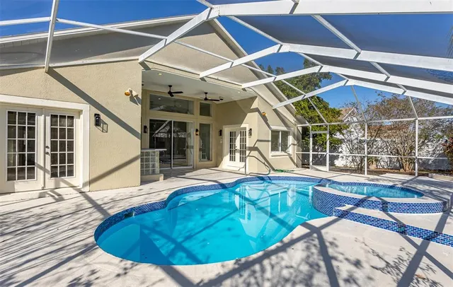 a view of a house with swimming pool