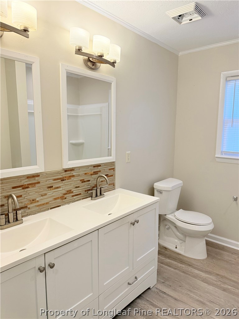 425 North Platte Road Fayetteville, NC 28303 - Photo 15 of 30 a bathroom with a sink and a mirror