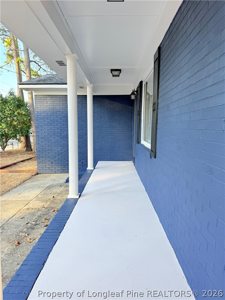 425 North Platte Road Fayetteville, NC 28303 - Photo 4 of 30 a view of a hallway with wooden door
