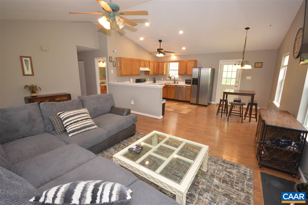 414 Morning Glory Road Ruckersville, VA 22968 - Photo 3 of 15 a living room with furniture and a wooden floor