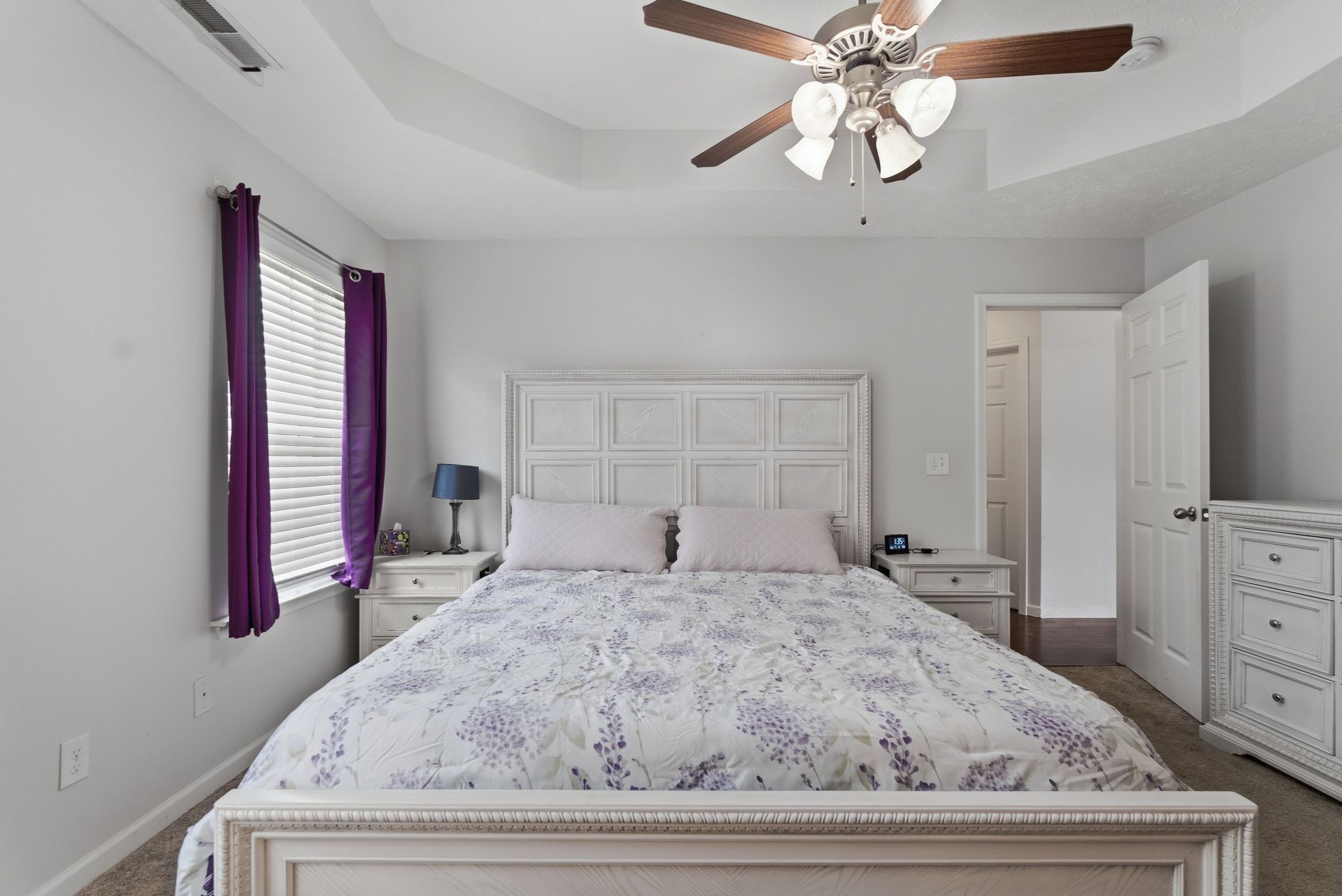 2045 Barretts Ridge Drive Murfreesboro, TN 37130 - Photo 18 of 33 a bedroom with a large bed and a chandelier