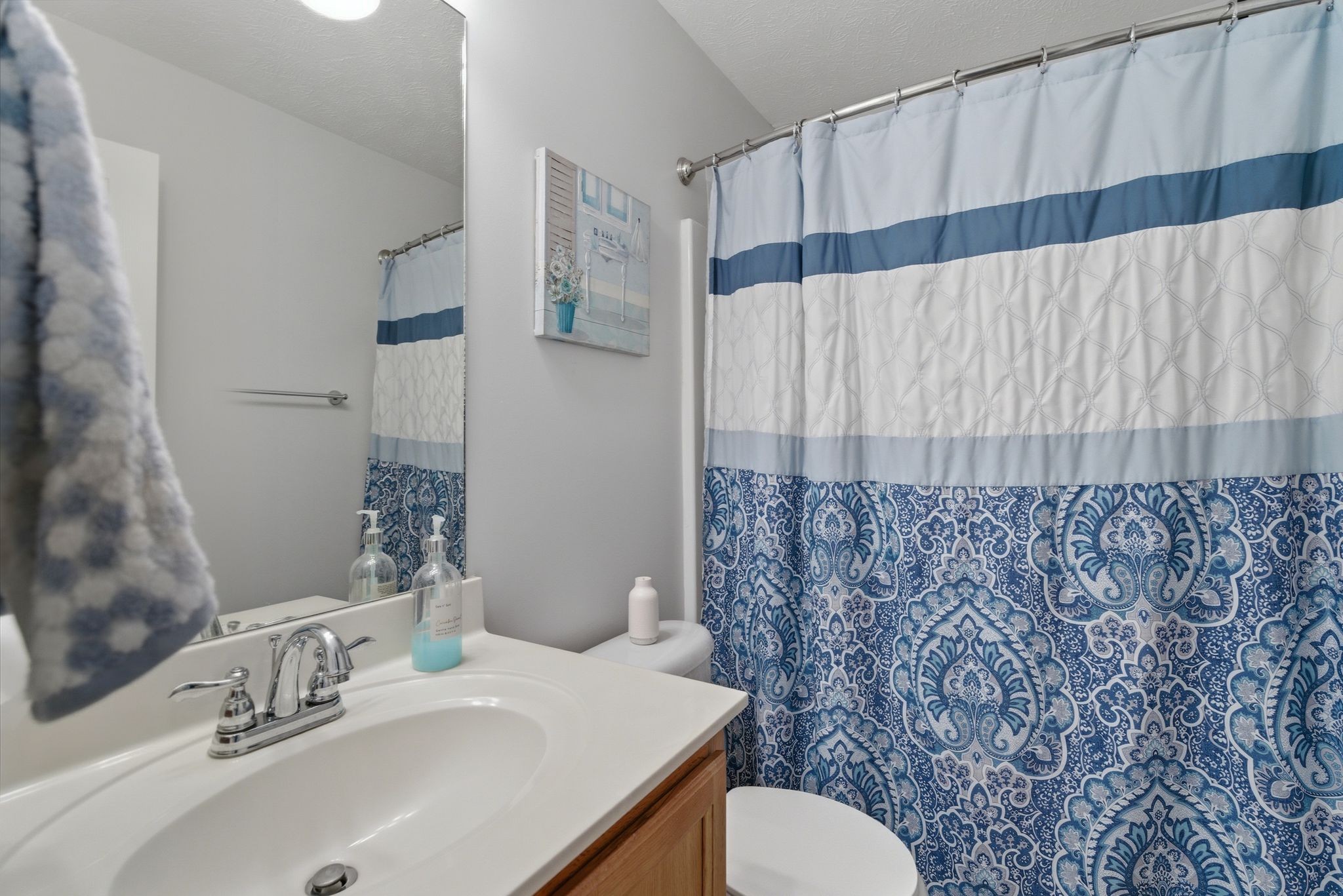 2045 Barretts Ridge Drive Murfreesboro, TN 37130 - Photo 22 of 33 a bathroom with a sink and a mirror