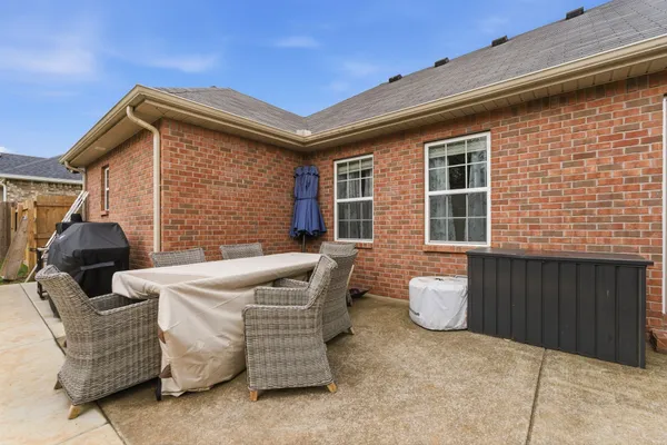a front view of a house with patio