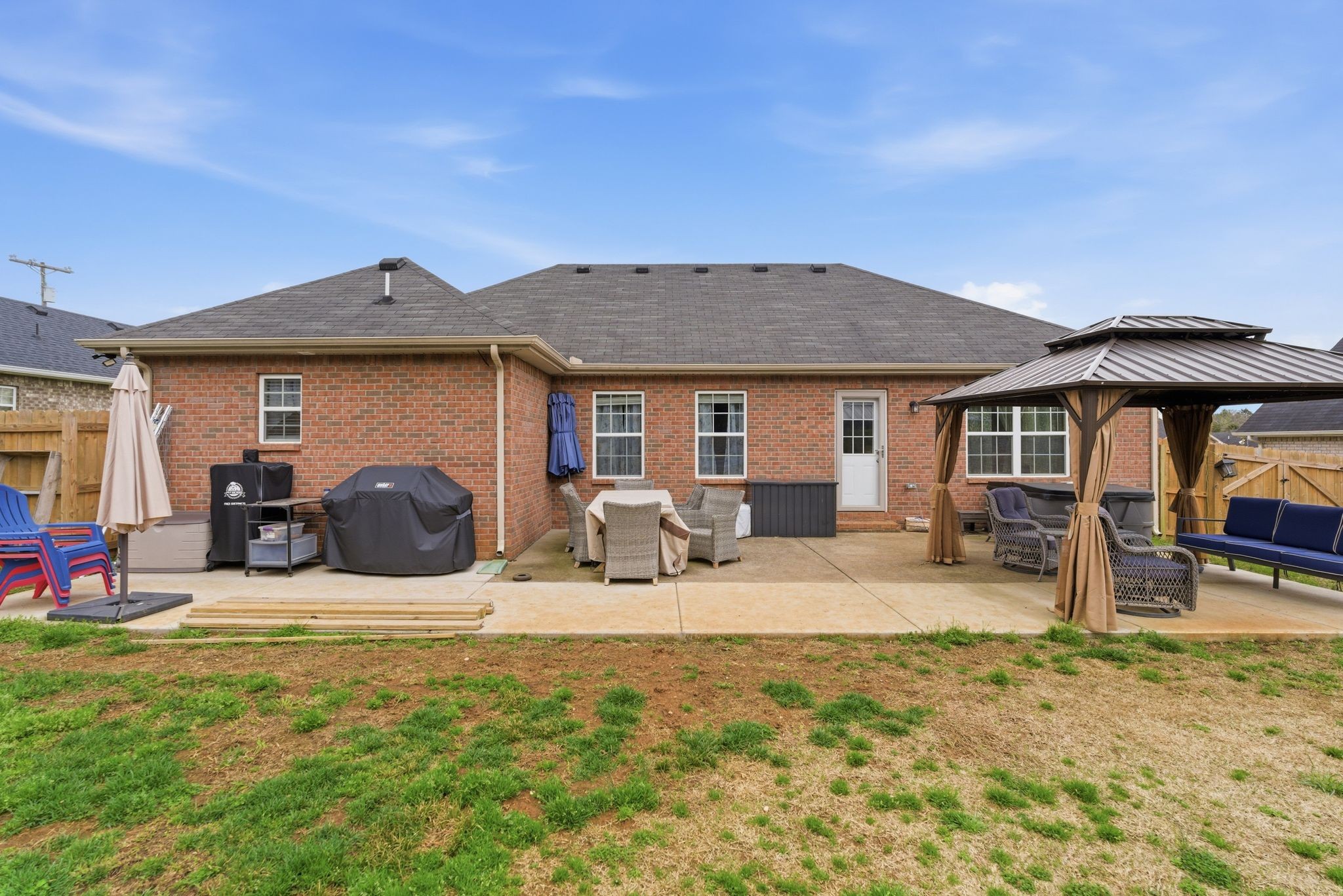 2045 Barretts Ridge Drive Murfreesboro, TN 37130 - Photo 26 of 33 a front view of a house with yard patio and fire pit