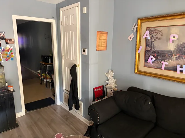 a living room with furniture and a window