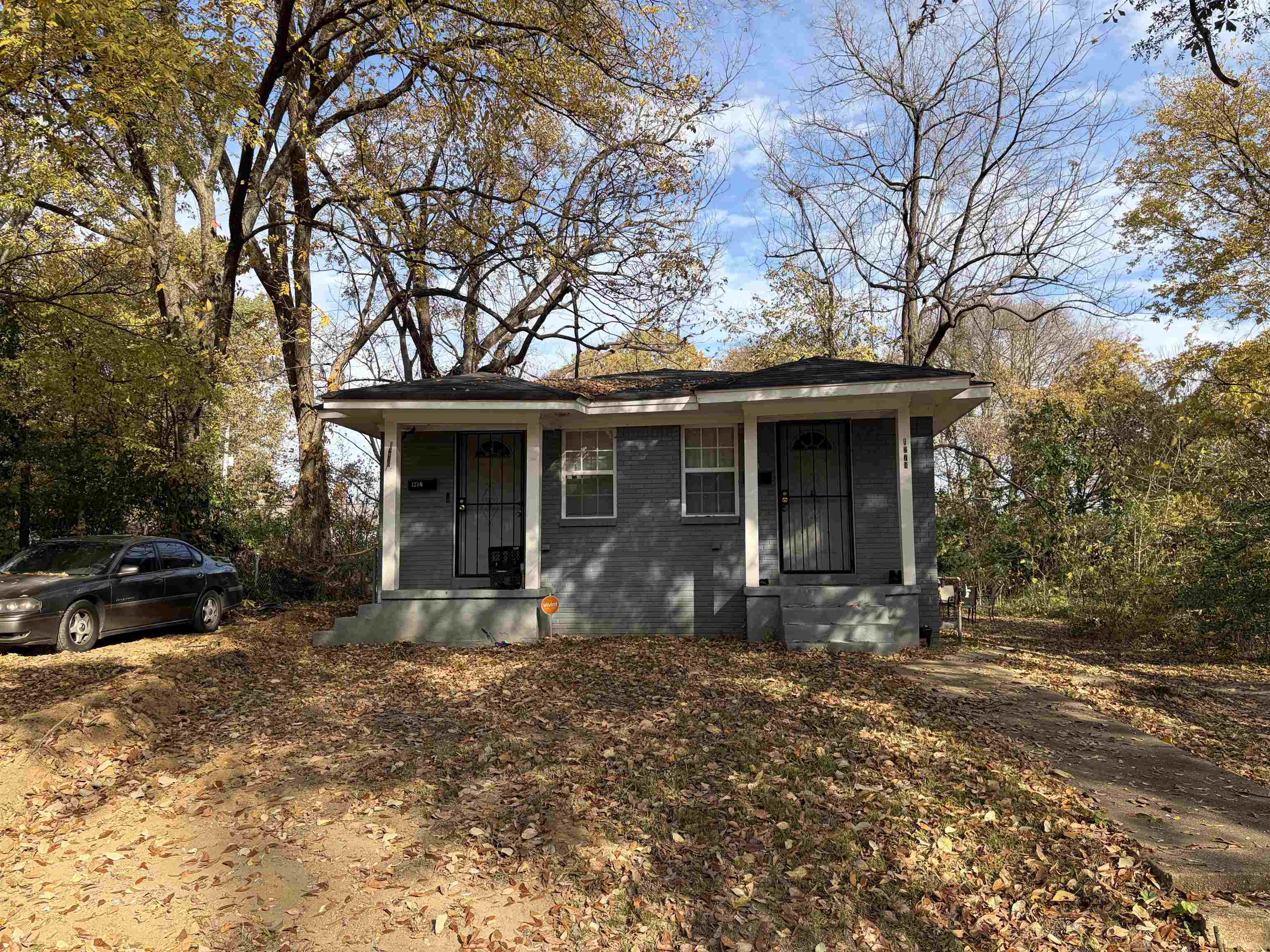 1278 Edith Avenue Memphis, TN 38106 - Photo 2 of 17 a front view of a house with yard furniture and garage