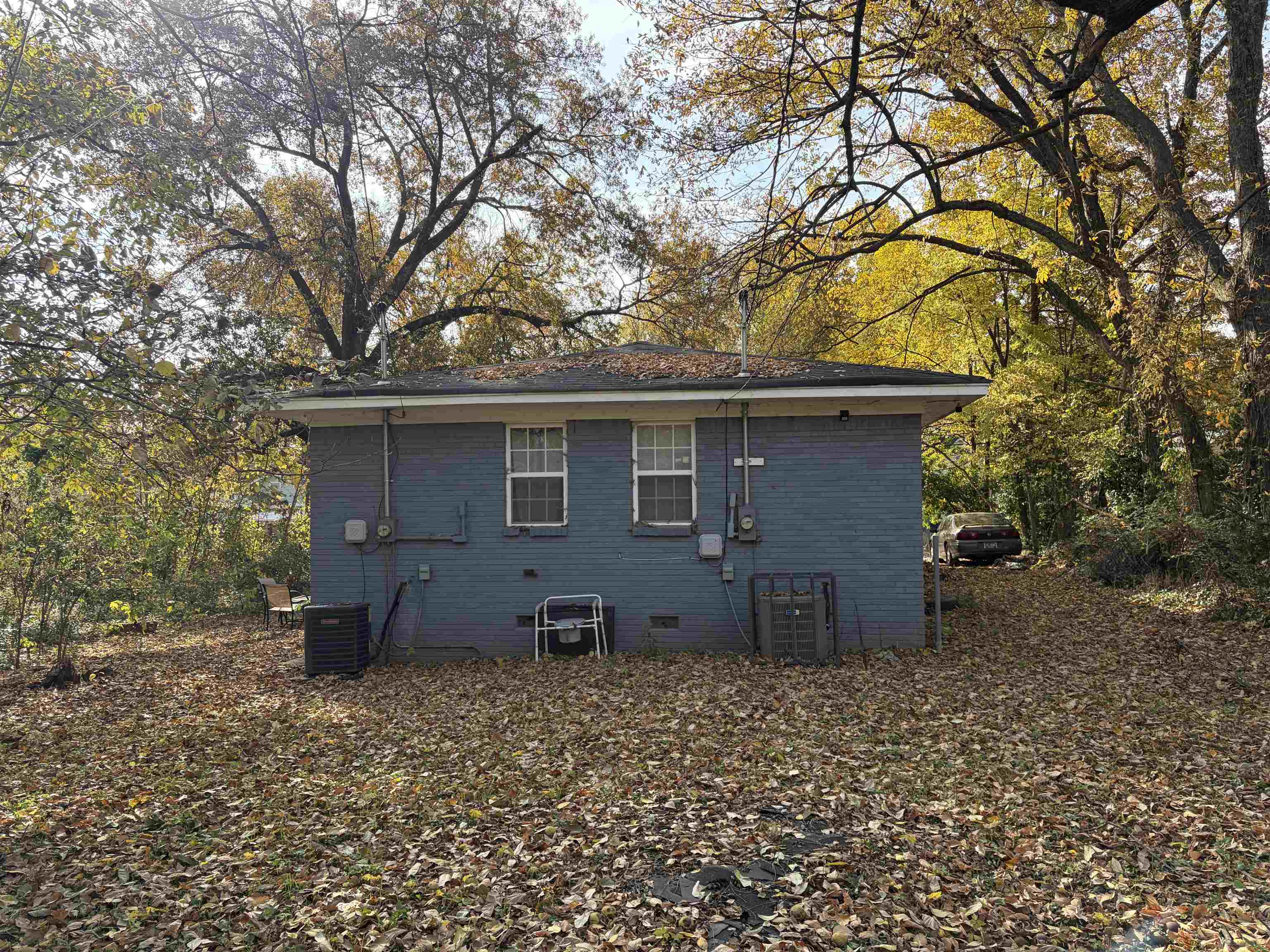 1278 Edith Avenue Memphis, TN 38106 - Photo 7 of 17 a backyard of a house with barbeque oven and large trees
