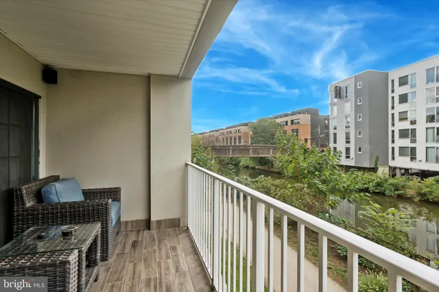a view of balcony with furniture