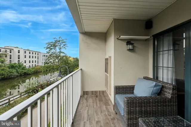 a view of balcony with furniture