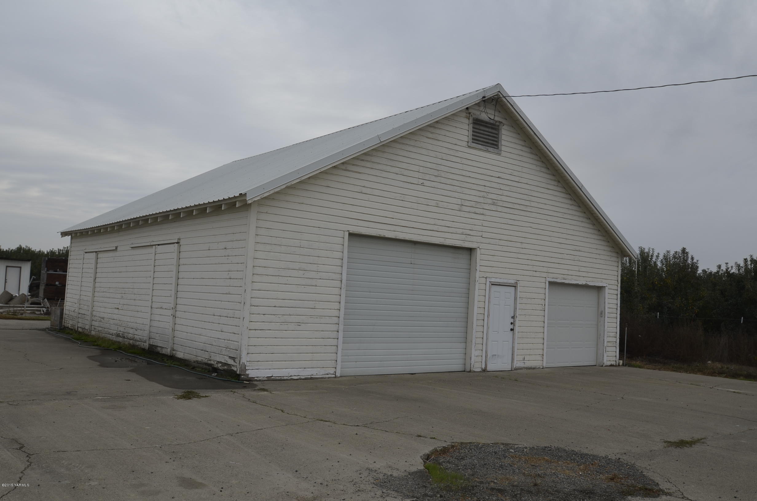 5131 Konnowac Pass Road Wapato, WA 98951 - Photo 14 of 18 a view of a house with garage