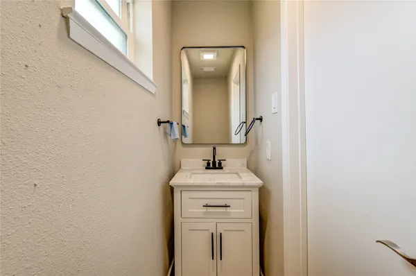 a sink with a mirror