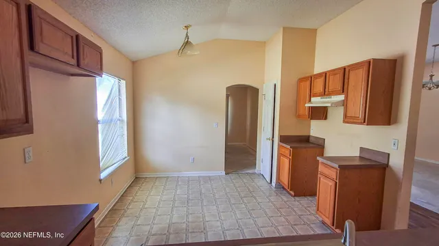 a view of walk in closet with window