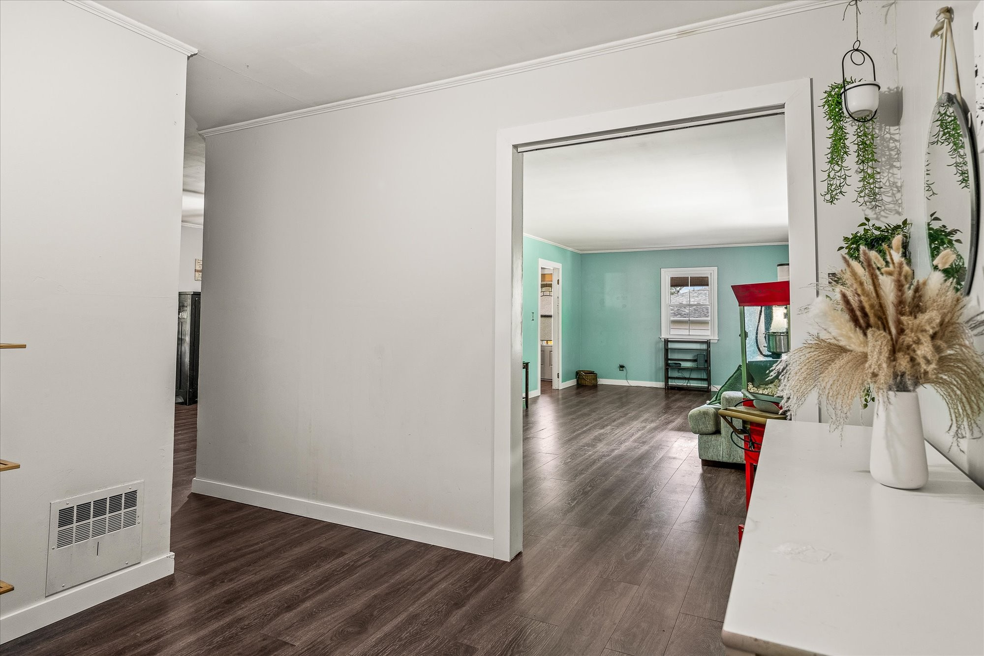 180 Frank Anderson Road Sparta, TN 38583 - Photo 14 of 45 an empty room with wooden floor and windows