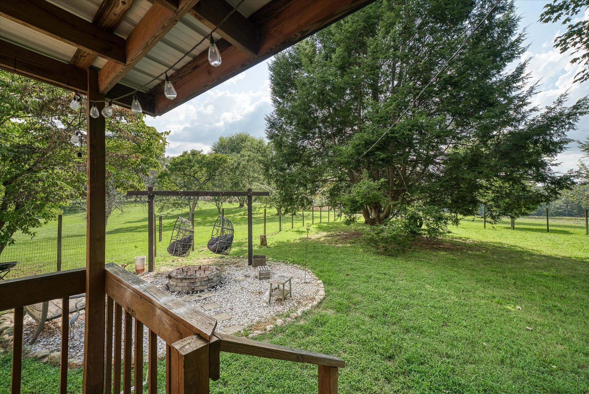 180 Frank Anderson Road Sparta, TN 38583 - Photo 26 of 45 a view of a deck with a big yard