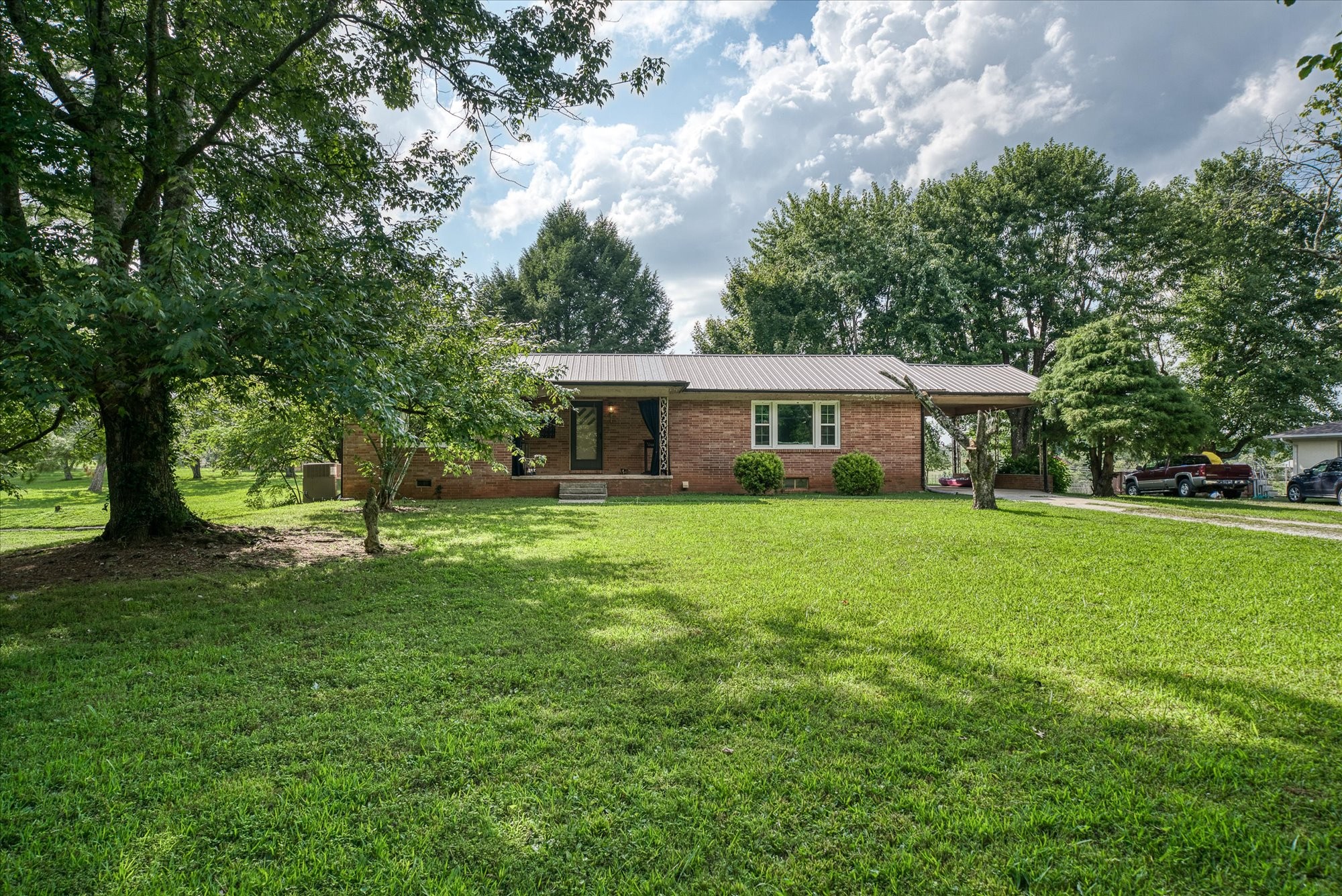 180 Frank Anderson Road Sparta, TN 38583 - Photo 37 of 45 a front view of a house with a yard