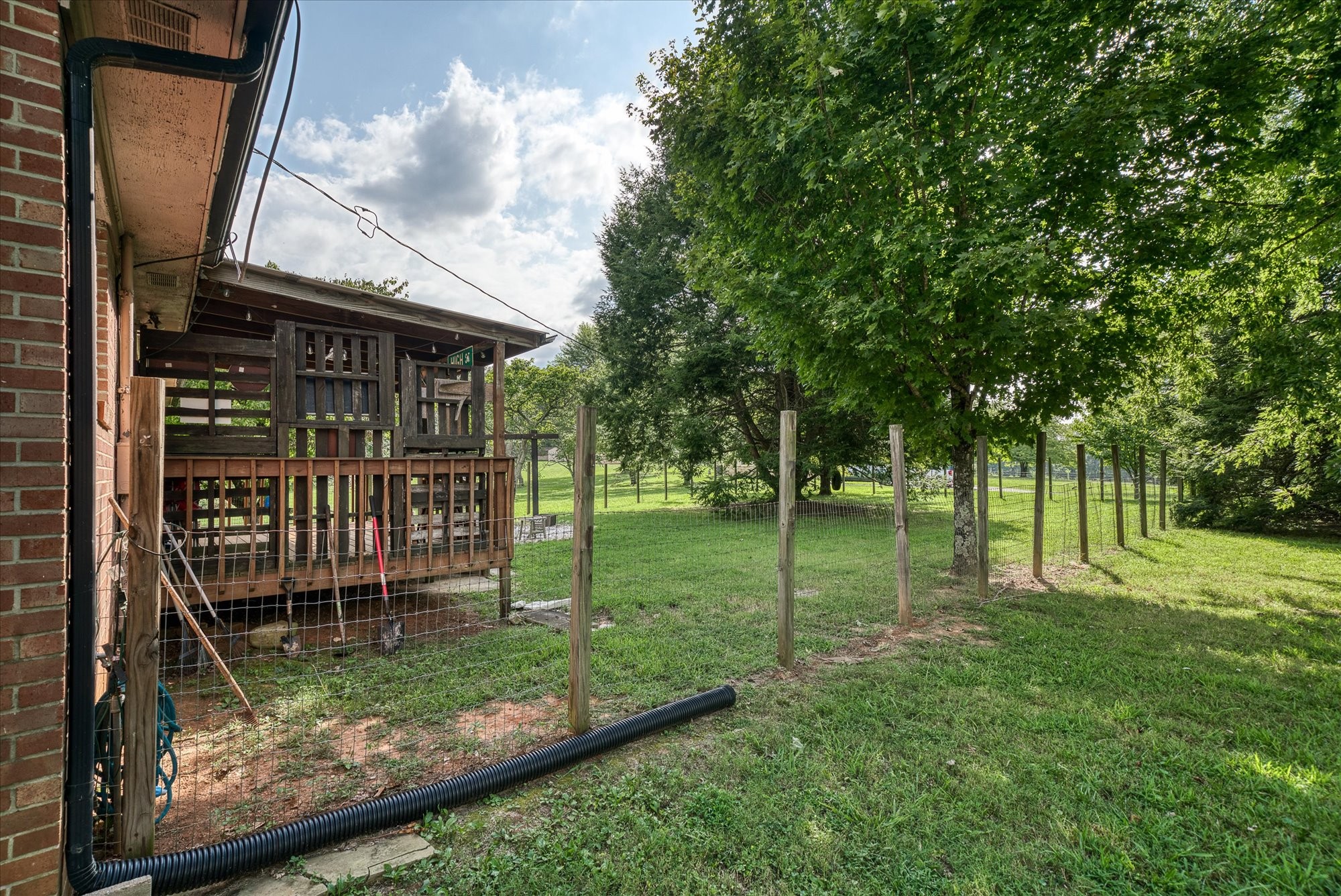 180 Frank Anderson Road Sparta, TN 38583 - Photo 42 of 45 a backyard of a house with lots of green space