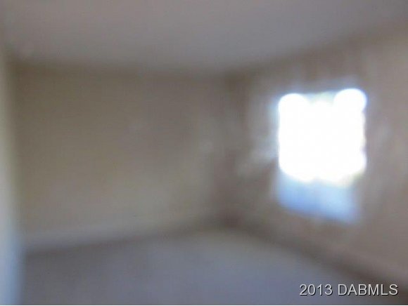 304 Mariners Gate Drive Edgewater, FL 32141 - Photo 8 of 16 a view of empty room