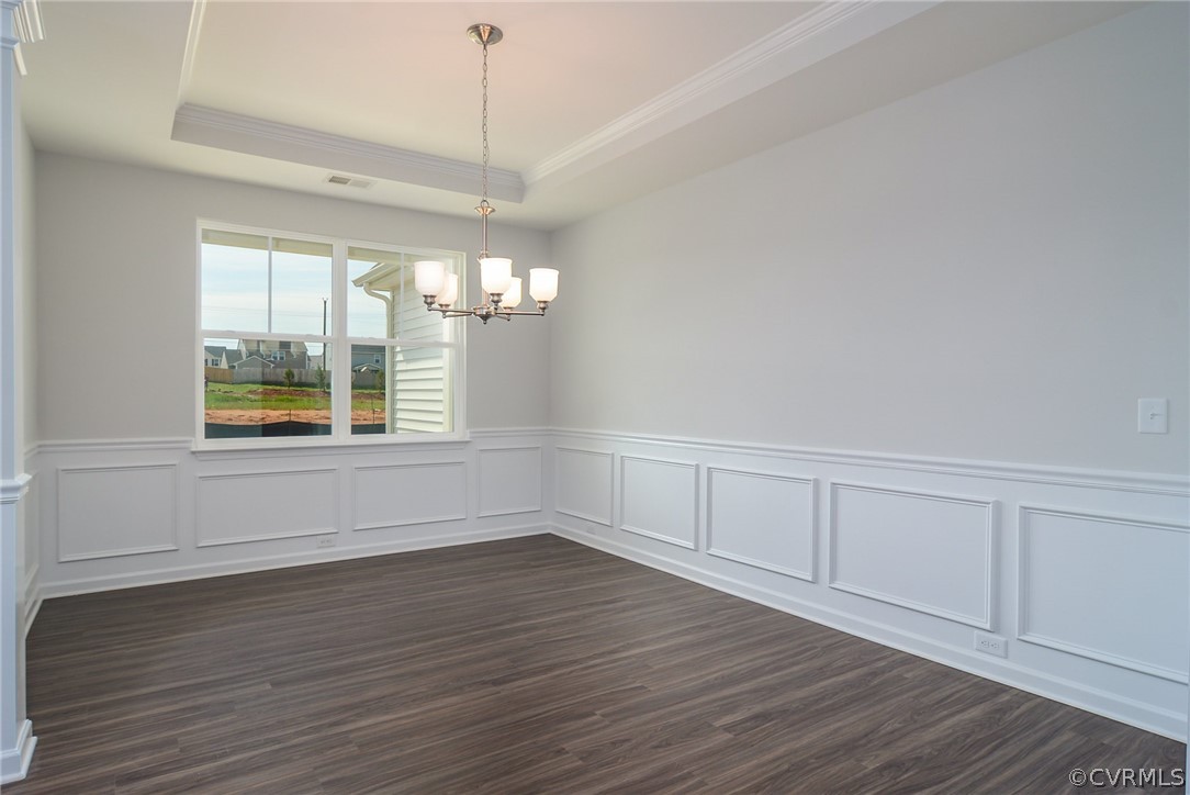 3806 Belspring Road Chester, VA 23831 - Photo 3 of 14 a view of an empty room with wooden floor and a window