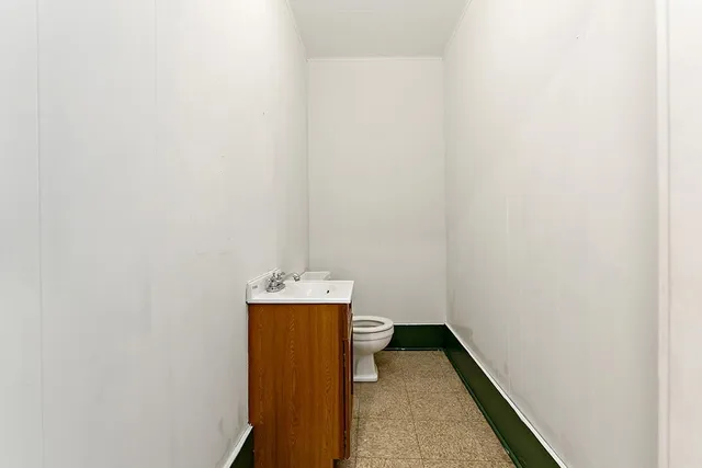 a view of small space with wooden floor