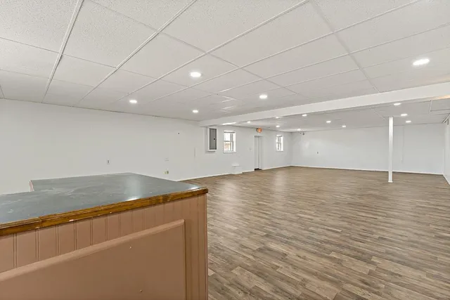 a view of room and wooden floor