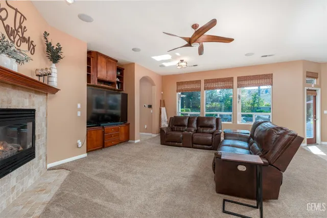 a view of store room with racks and a book shelf