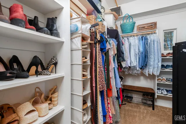 a workspace with furniture and a book shelf