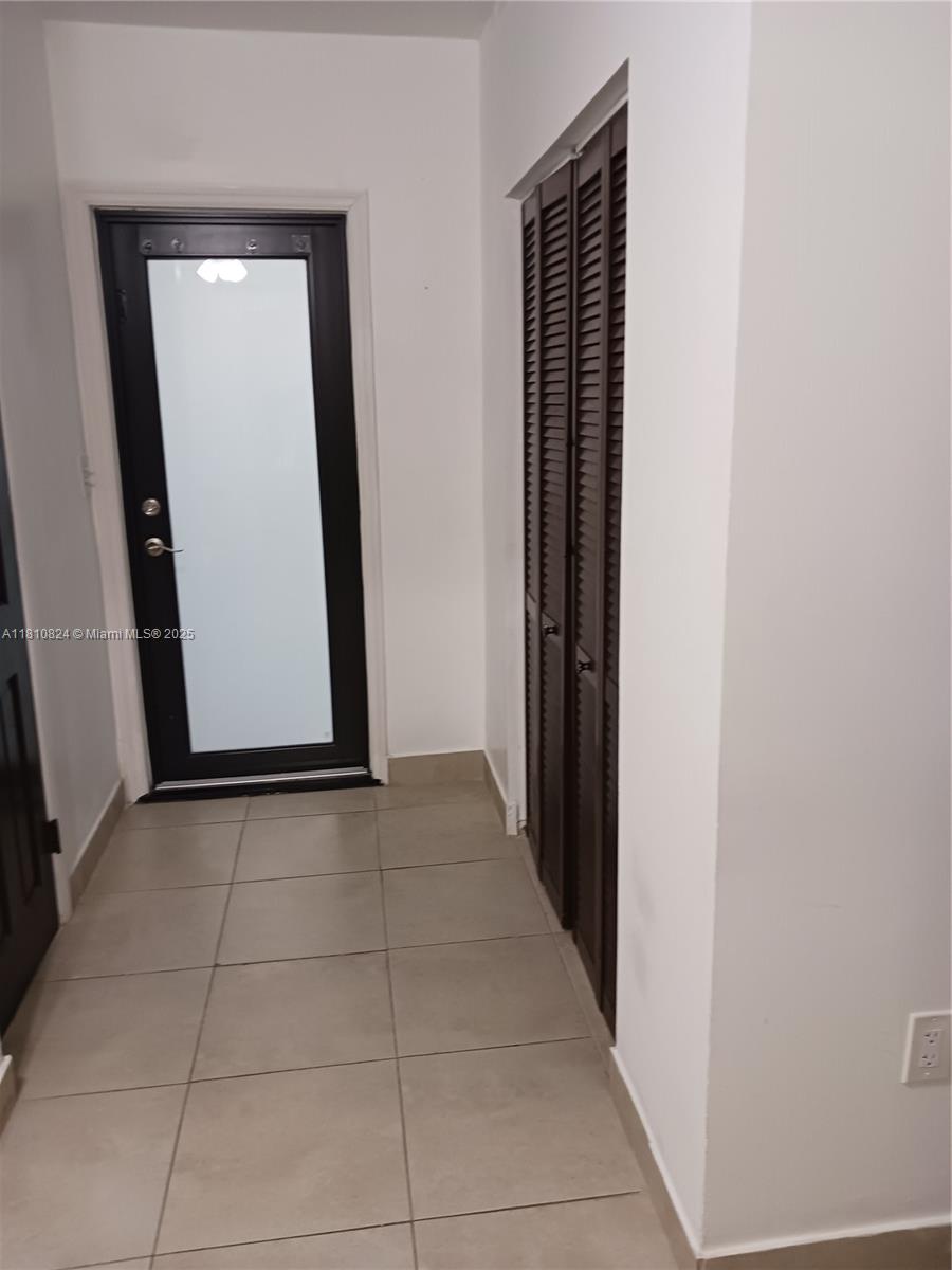 3429 Southwest 23rd Terrace Miami, FL 33145 - Photo 17 of 32 a view of a hallway with wooden floor