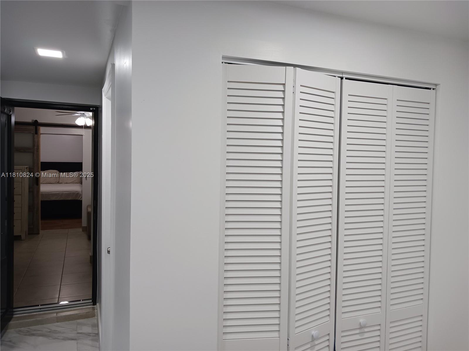 3429 Southwest 23rd Terrace Miami, FL 33145 - Photo 28 of 32 a view of a room with a door
