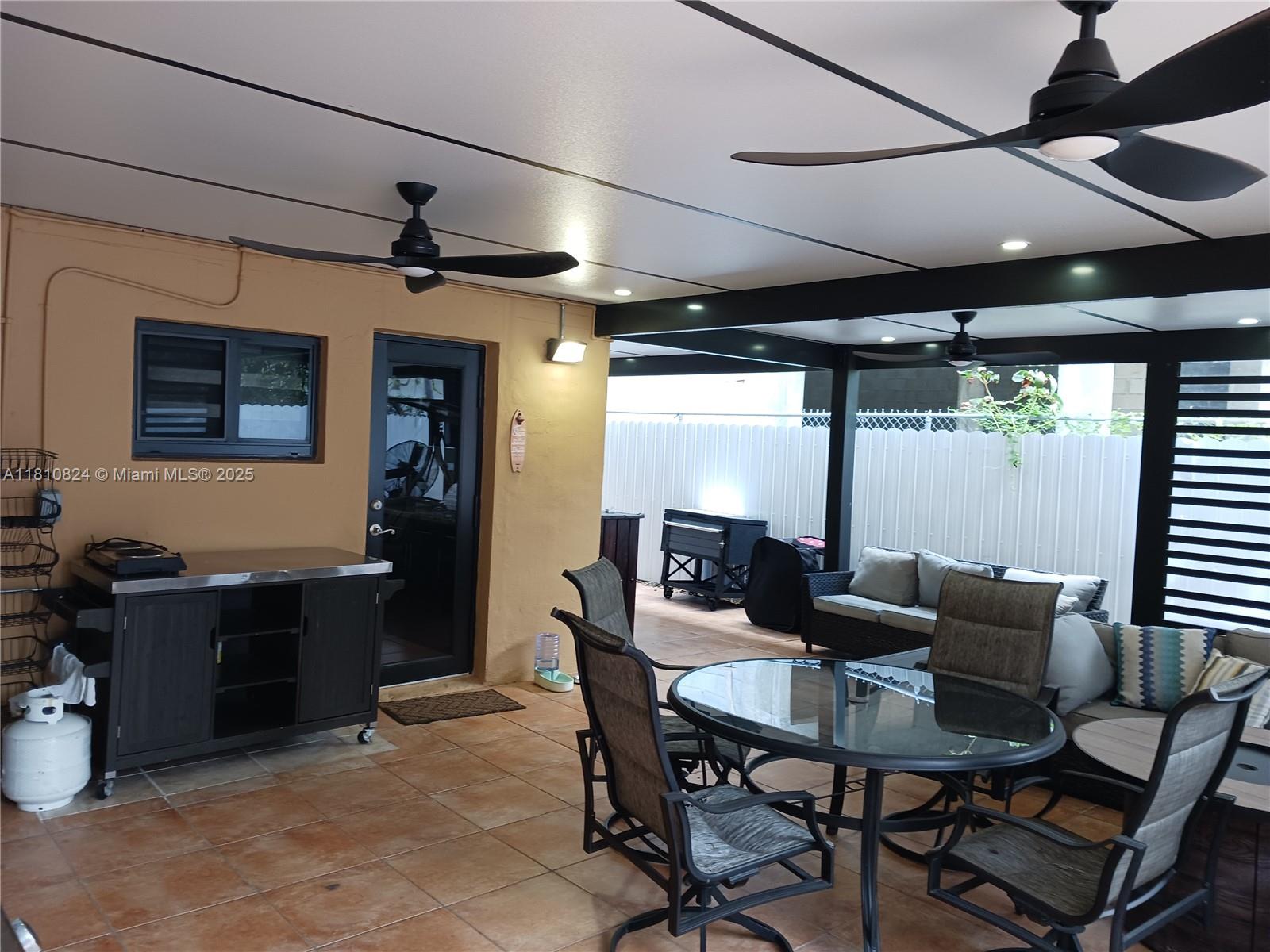 3429 Southwest 23rd Terrace Miami, FL 33145 - Photo 31 of 32 a dining room with furniture and window