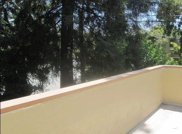 a view of a lake from a balcony