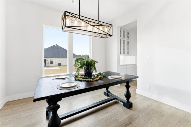 a view of a workspace with furniture