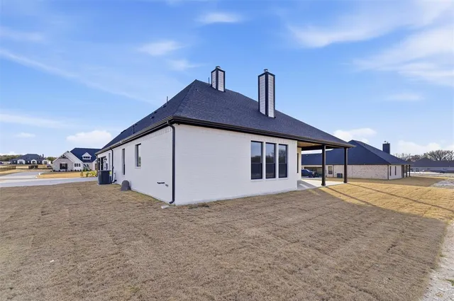 a house with trees in front of it
