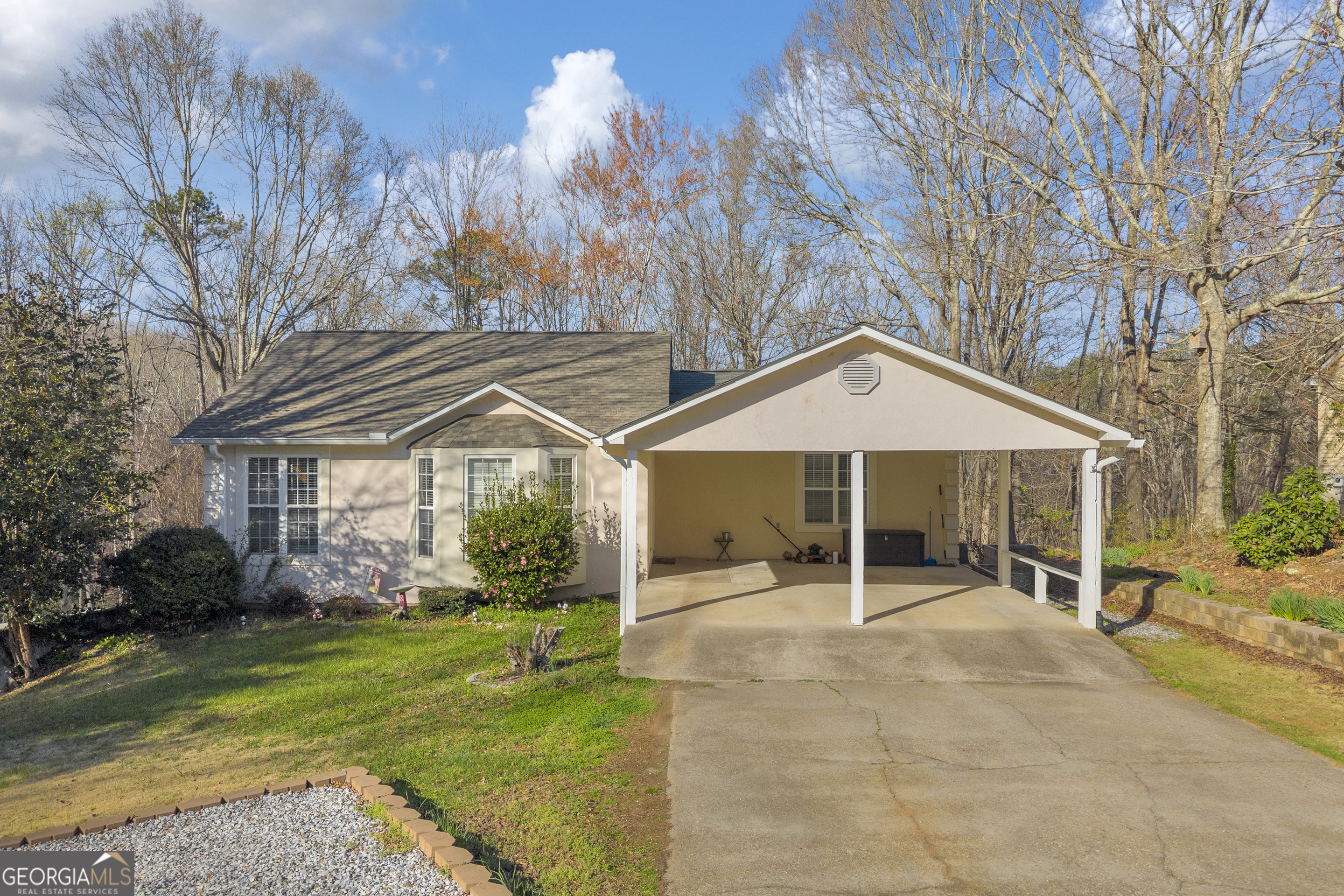 415 Ivory Drive Baldwin, GA 30511 - Photo 2 of 57 a view of a house with backyard and porch