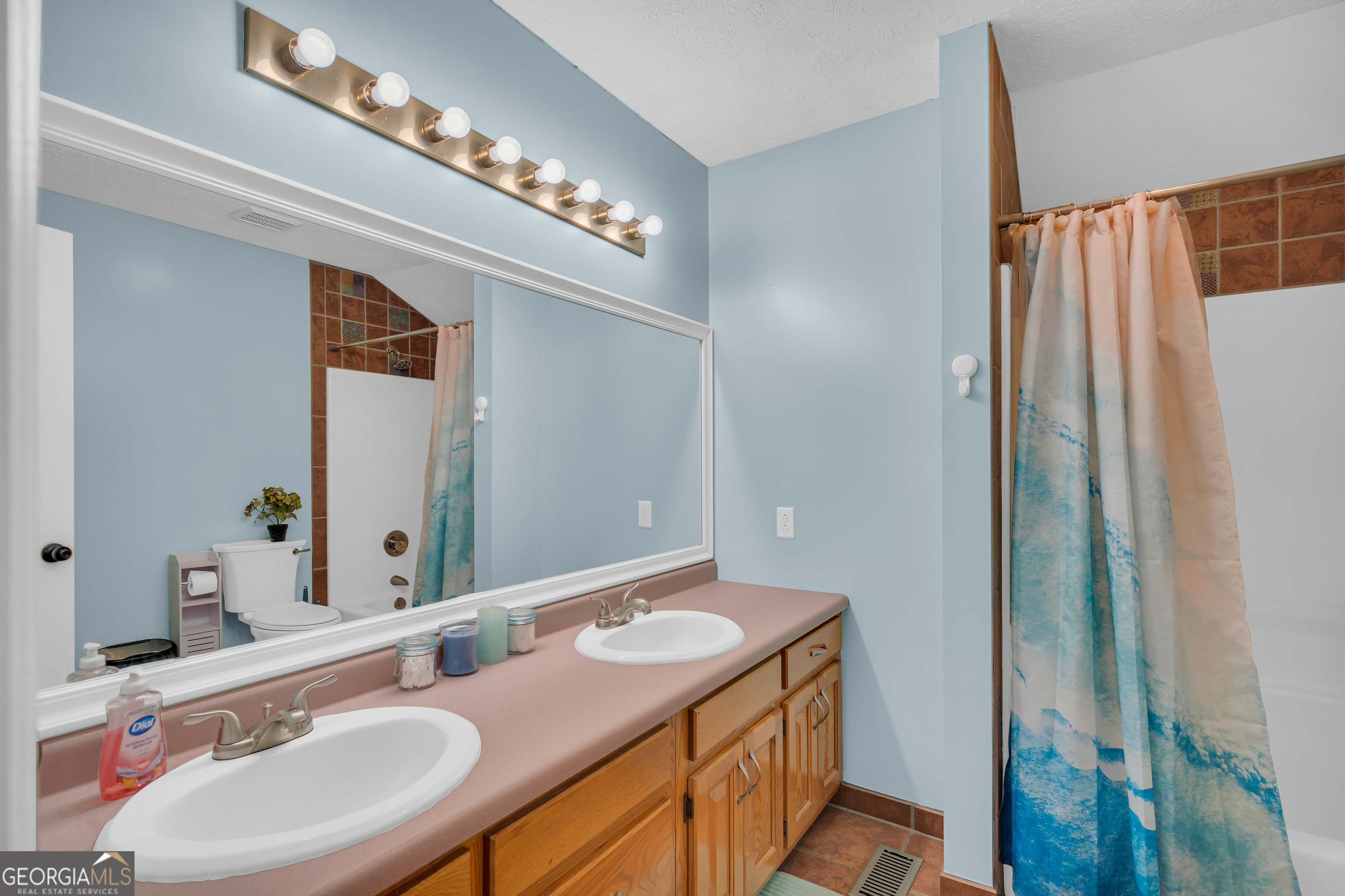 415 Ivory Drive Baldwin, GA 30511 - Photo 32 of 57 a bathroom with a sink and a mirror