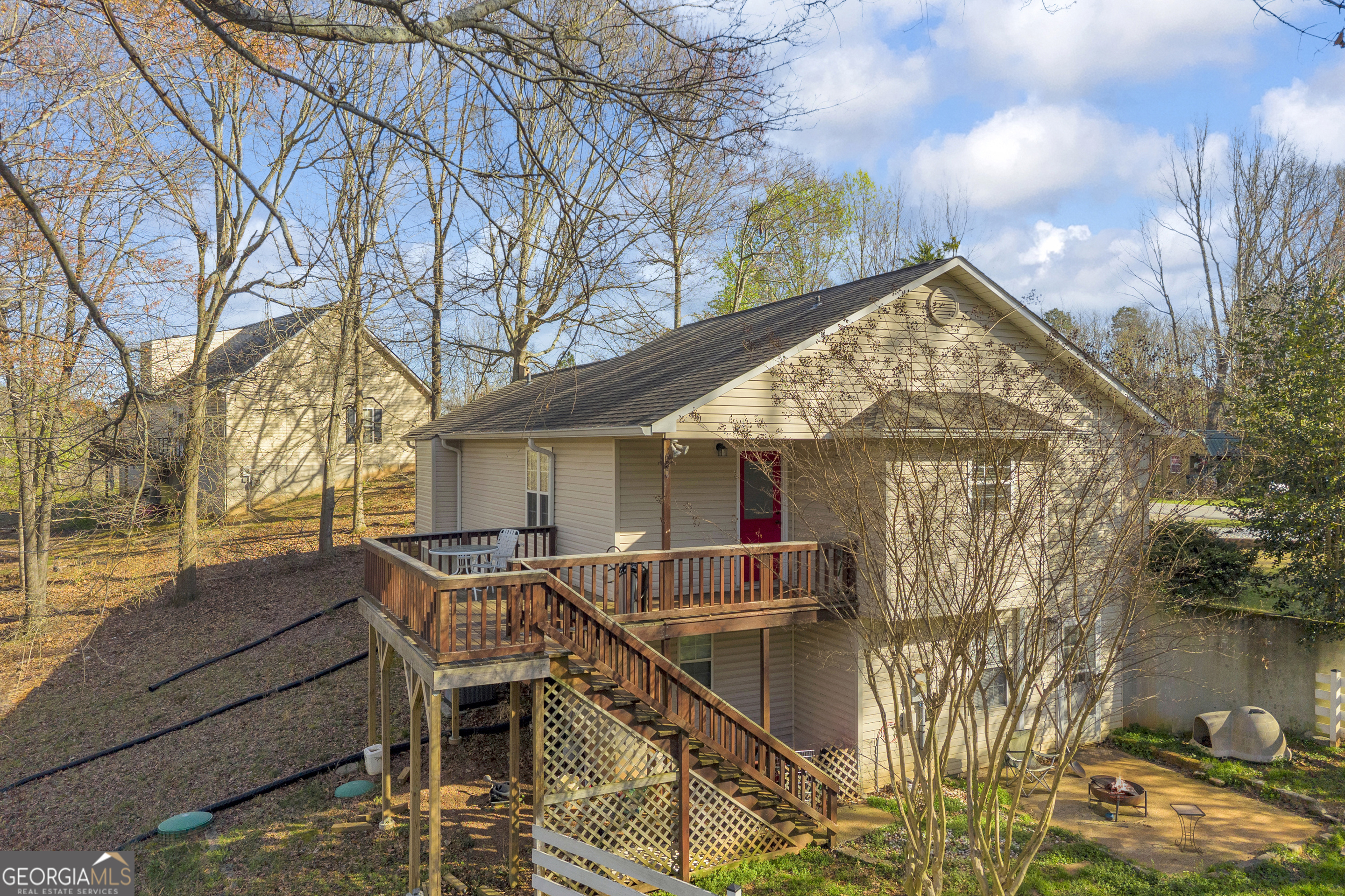 415 Ivory Drive Baldwin, GA 30511 - Photo 4 of 57 a view of house with backyard and trees