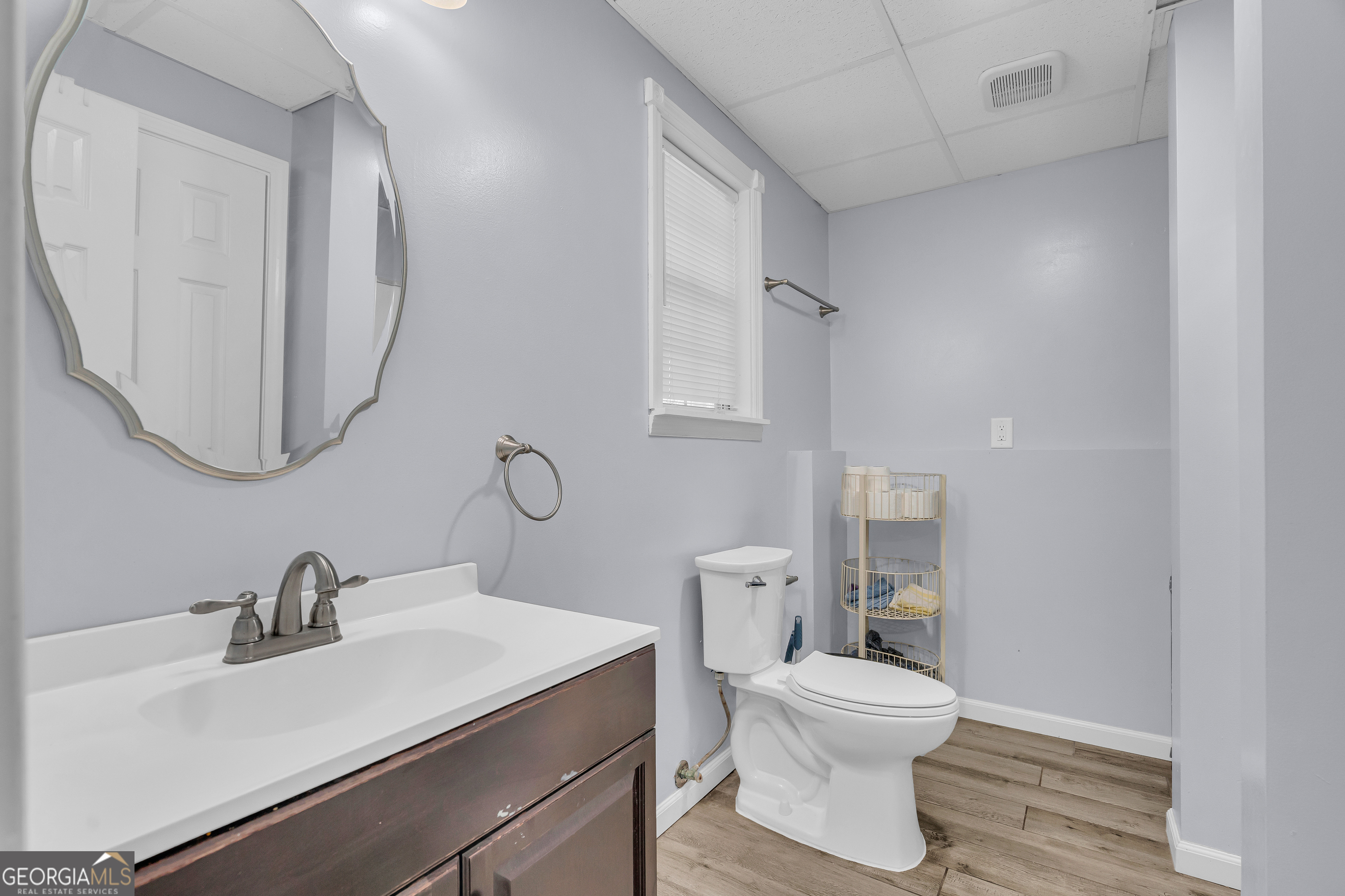 415 Ivory Drive Baldwin, GA 30511 - Photo 43 of 57 a bathroom with a sink toilet a mirror and vanity