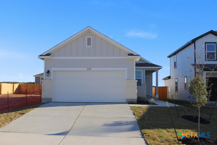 a front view of a house with patio