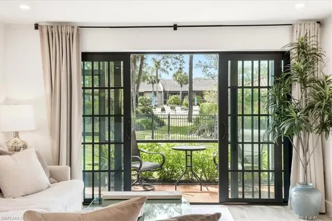 $450,000 | 3219 Horse Carriage Way, Unit 303, Naples, FL 34105