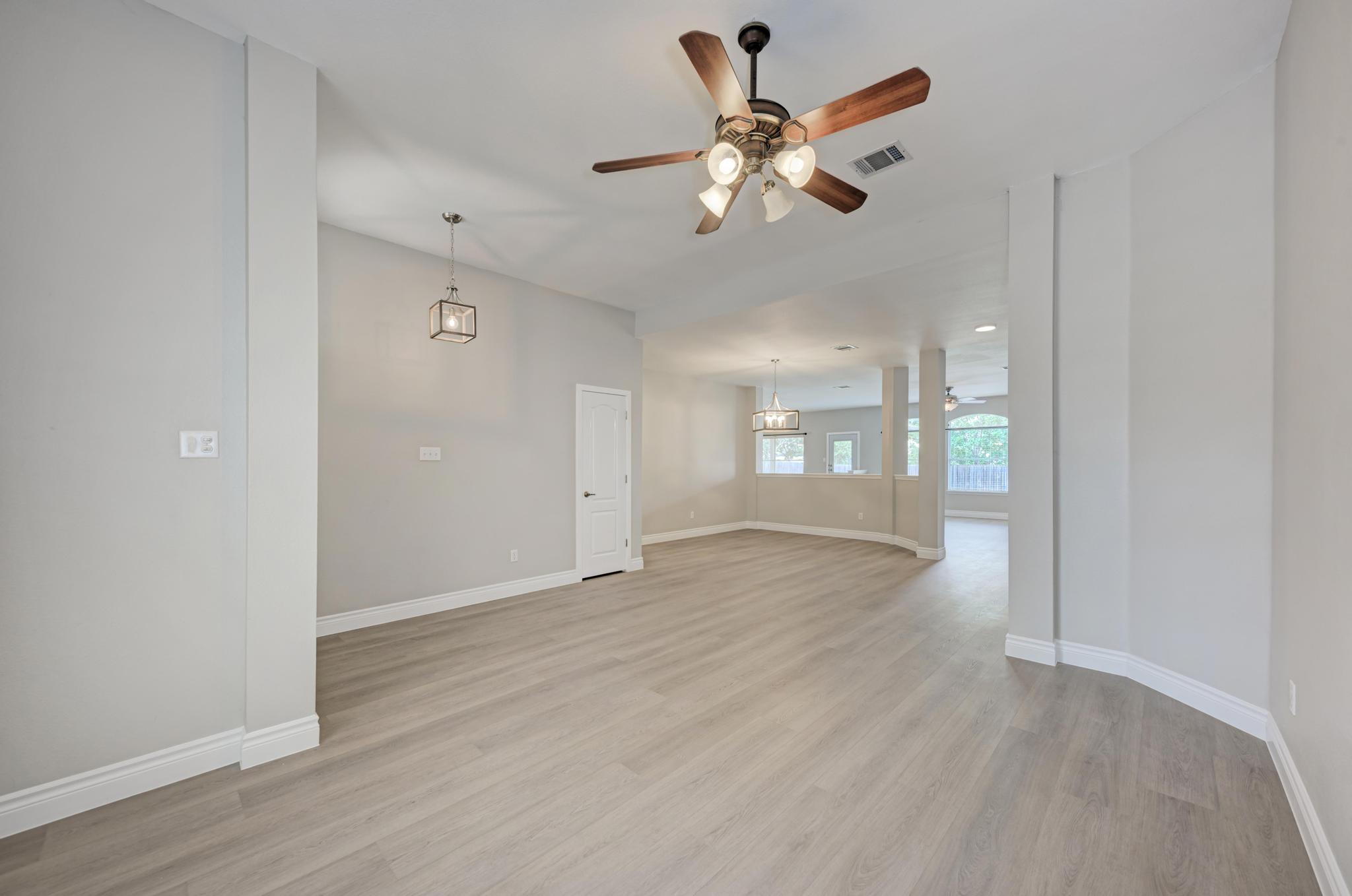 4408 Tello Path Austin, TX 78749 - Photo 5 of 38 Spare room with ceiling fan and light wood-style floors