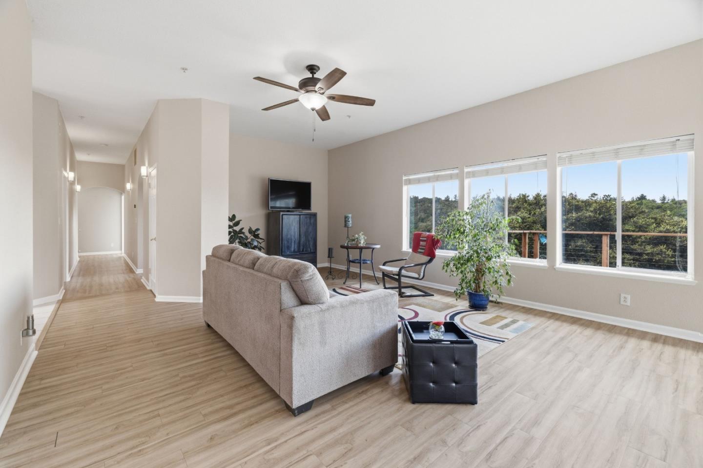 19269 Mallory Canyon Road, Unit D Salinas, CA 93907 - Photo 7 of 77 a living room with furniture and a large window