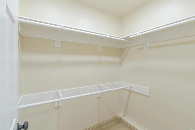 a view of small space with racks on the wall