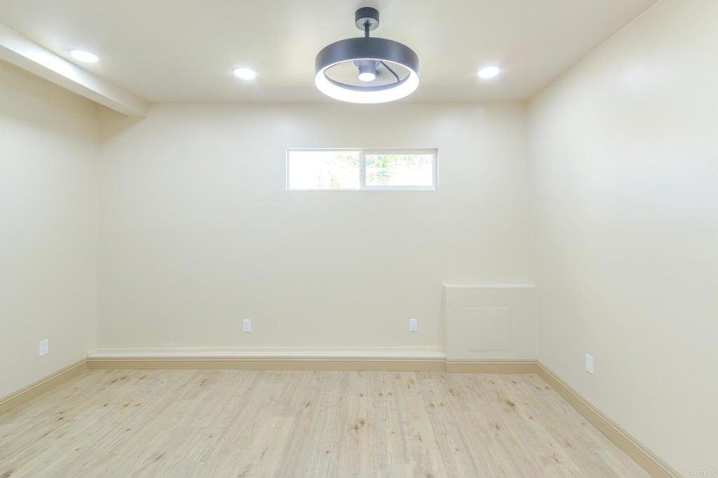 1174 Sea Strand Lane San Diego, CA 92154 - Photo 16 of 32 an empty room with a window