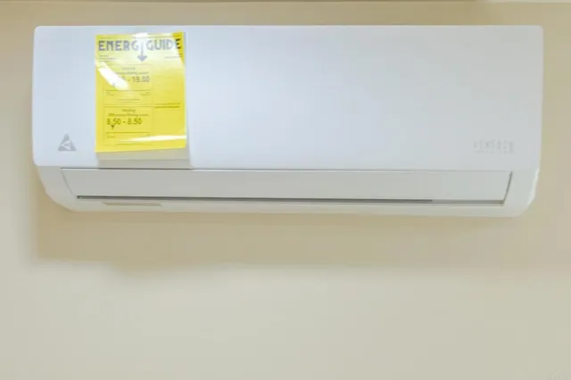 a bathroom with a granite countertop shower and a toilet