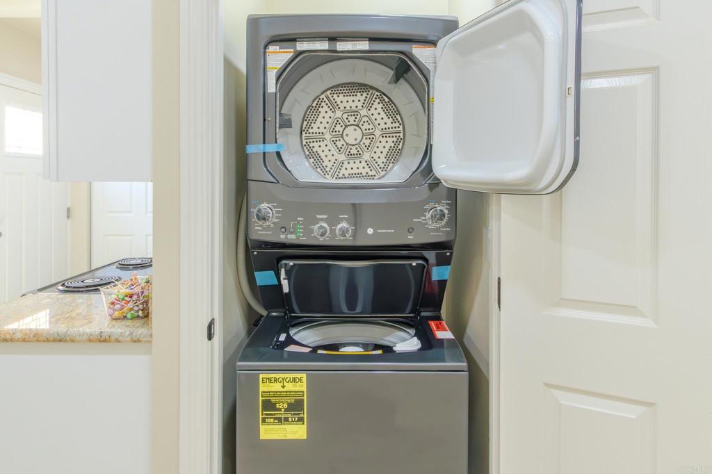 1174 Sea Strand Lane San Diego, CA 92154 - Photo 9 of 32 a view of washer and dryer
