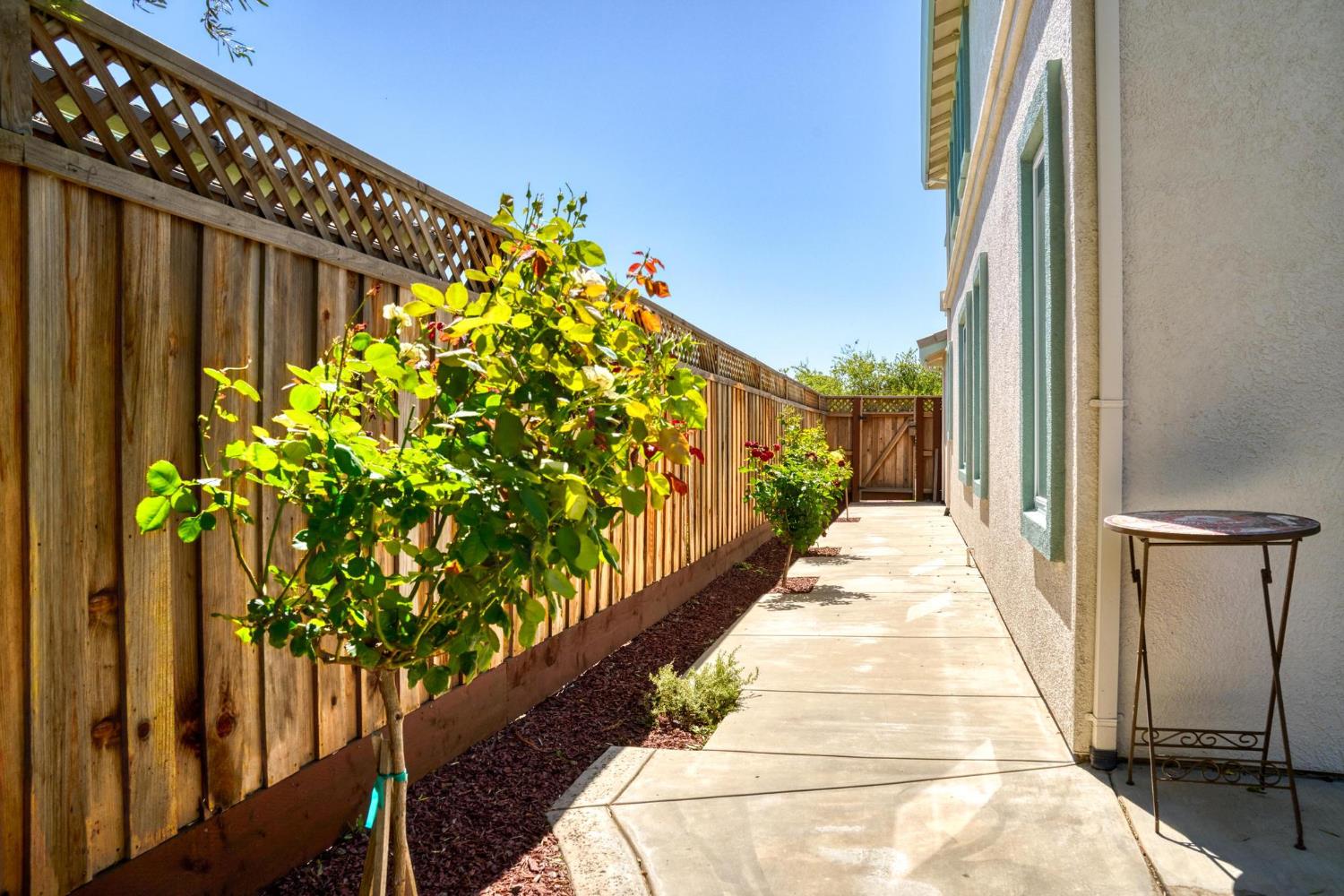 426 South Highland Avenue Ripon, CA 95366 - Photo 78 of 82 a view of a pathway of a house with wooden floor