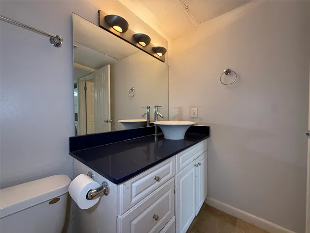 a view of a hallway with washer and dryer