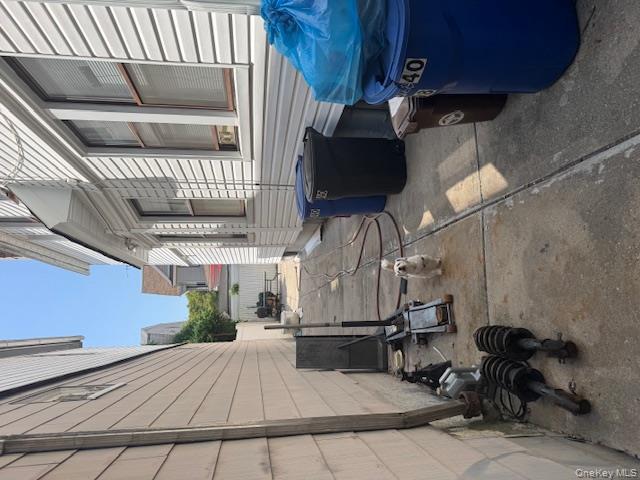 8540 98th Street Queens, NY 11421 - Photo 2 of 7 a view of a patio with table and chairs