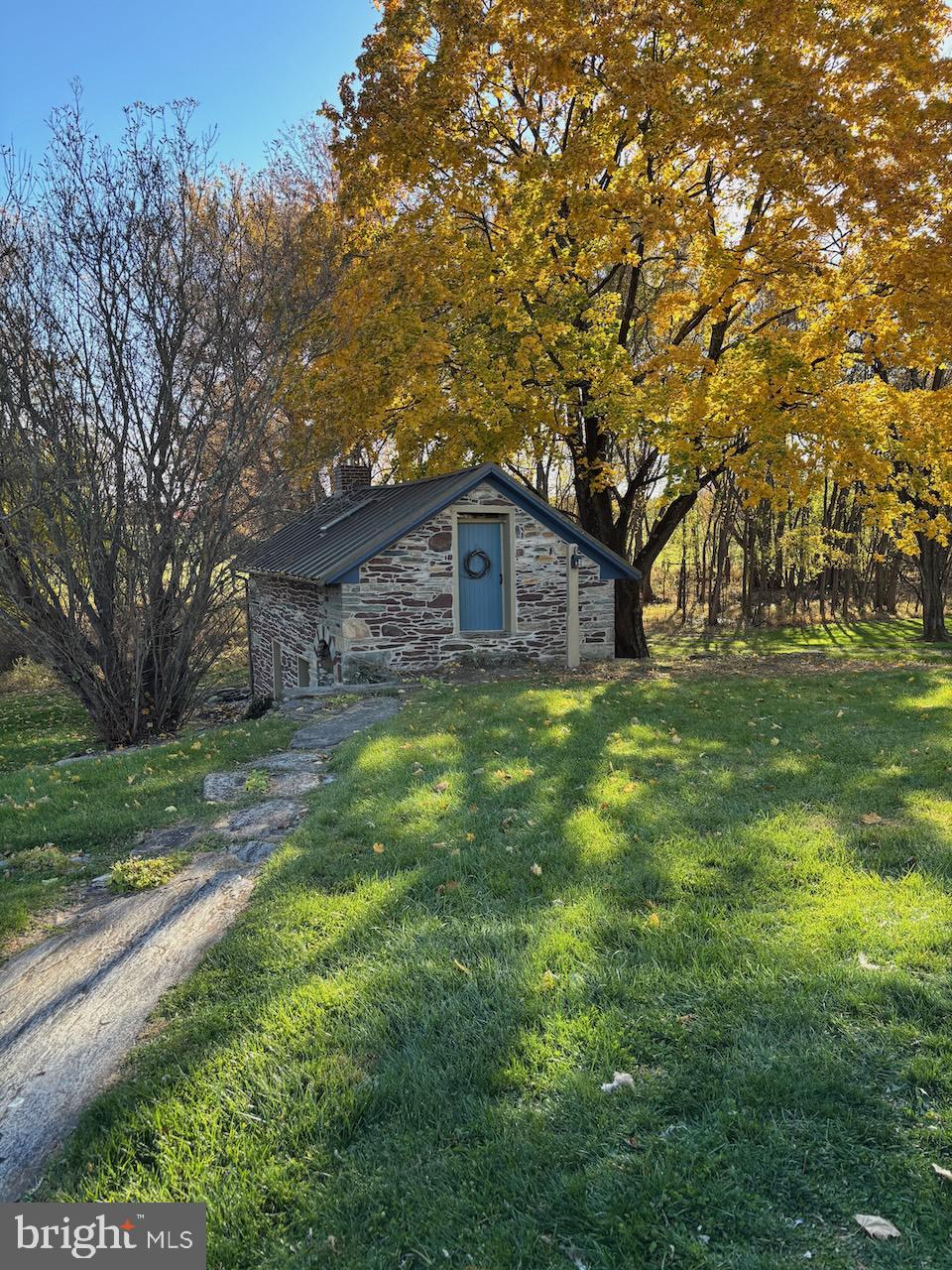 262 Orrtanna Road Orrtanna, PA 17353 - Photo 7 of 43 a view of a big yard with plants and large trees