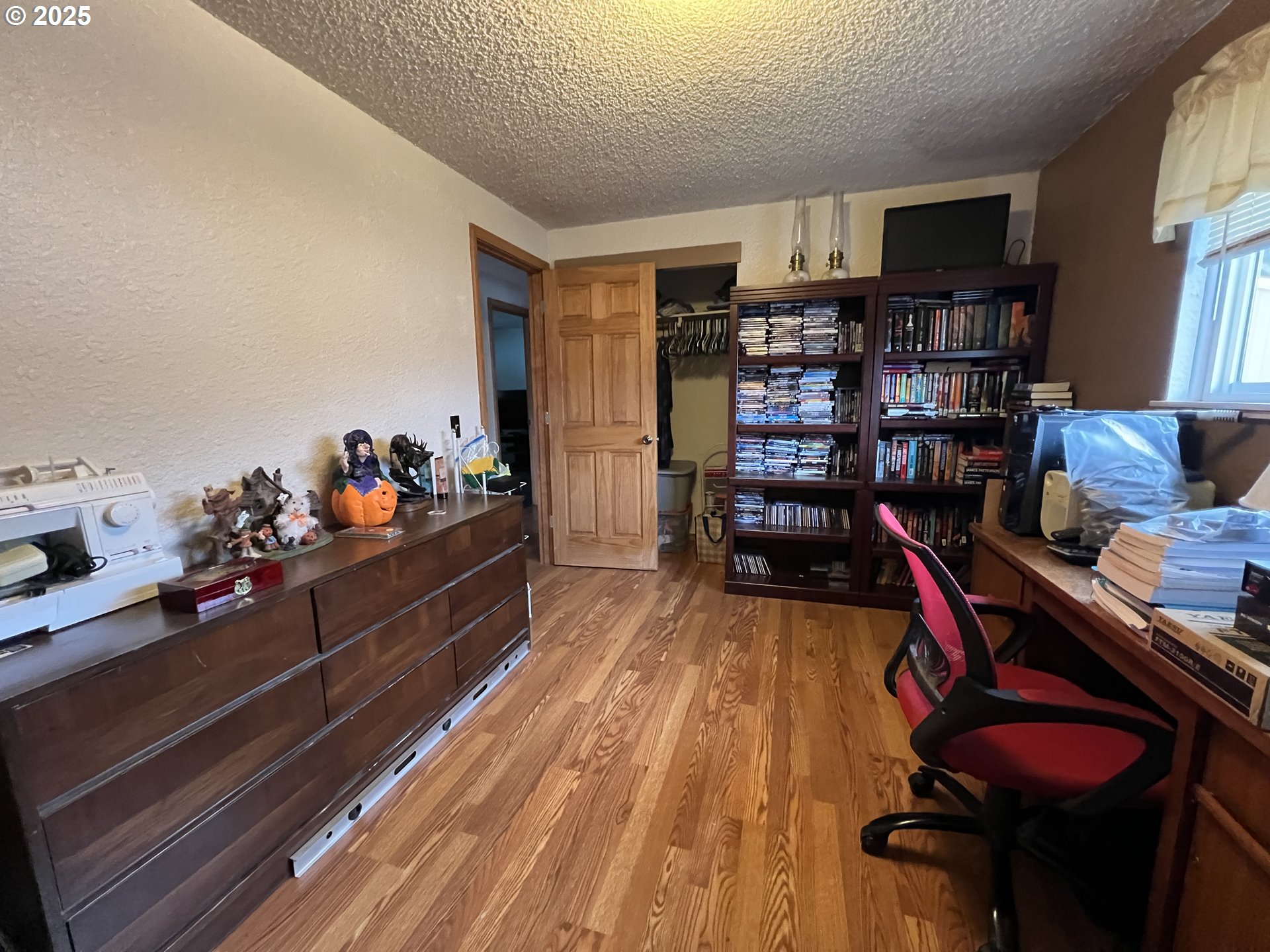 304 Hillcrest Drive John Day, OR 97845 - Photo 15 of 38 a room with furniture and wooden floor