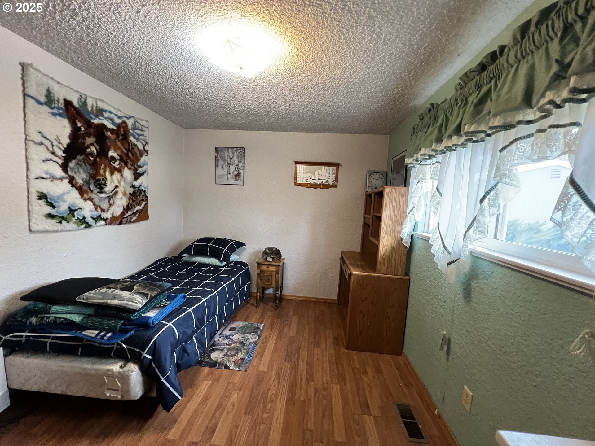 304 Hillcrest Drive John Day, OR 97845 - Photo 17 of 38 a bedroom with a bed and furniture